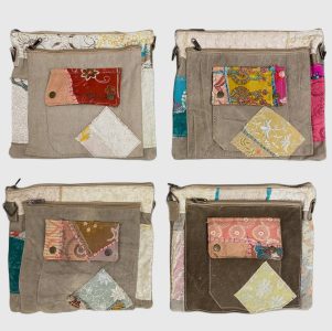 Four square canvas bags in different colors, each featuring patchwork fabric designs and matching wallets on the front.