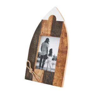 Wooden boat-shaped picture frame with a black-and-white photo of an adult and child holding hands, viewed from behind.