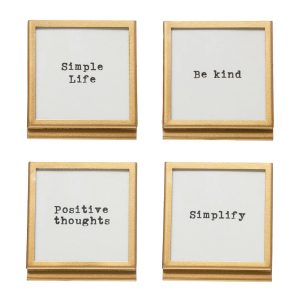 Four gold-framed quotes: "Simple Life," "Be kind," "Positive thoughts," and "Simplify," on a white background.