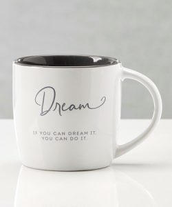 White ceramic mug with the word "Dream" and the phrase "If you can dream it, you can do it" printed on the front.
