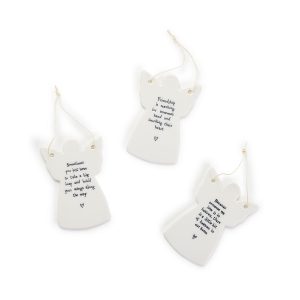 Three white ceramic angel ornaments with handwritten-style inspirational quotes and attached hanging strings on a white background.
