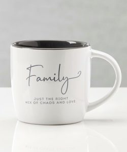 White ceramic mug with "Family" and "Just the right mix of chaos and love." printed in black and gray text.