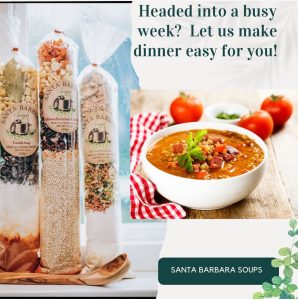 Three packaged soup mixes stand next to a bowl of soup garnished with parsley and diced tomatoes. Text promotes easy dinners.