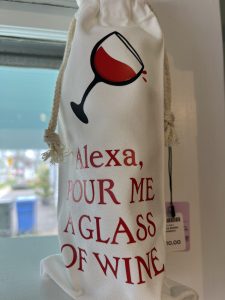 A white wine bag with a red wine glass graphic and the text "Alexa, pour me a glass of wine" in red letters.