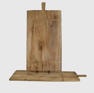 Two rectangular wooden cutting boards with handles, one standing upright and one lying flat against a plain white background.