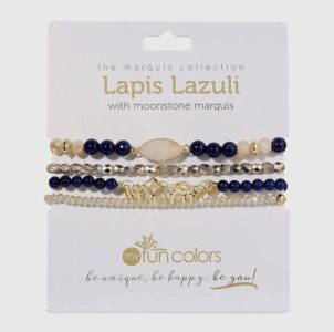 Four beaded bracelets with blue, gold, and cream tones displayed on a card labeled "Lapis Lazuli with moonstone marquis.