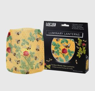 A Modgy luminary lantern with a bee and flower honeycomb design next to its packaging, which displays the same pattern.