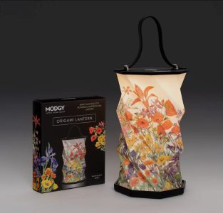 A floral origami lantern with a black handle is displayed next to its packaging featuring the same flower design.