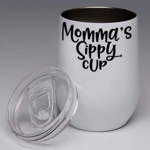 A white tumbler with a removable clear lid, labeled "Momma's Sippy Cup" in bold black script.