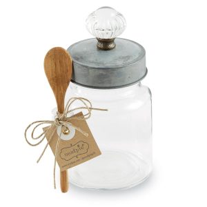 Clear glass jar with a metal lid, a small wooden spoon, and a tag tied with twine.