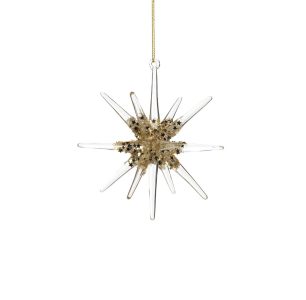 Clear glass star ornament with gold glitter accents, hanging from a thin gold string against a white background.