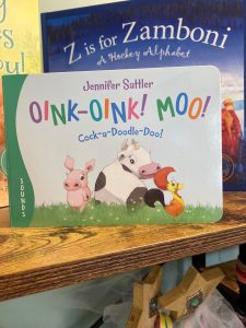 Children’s book titled "Oink-Oink! Moo! Cock-a-Doodle-Doo!" by Jennifer Sattler featuring farm animals on the cover.